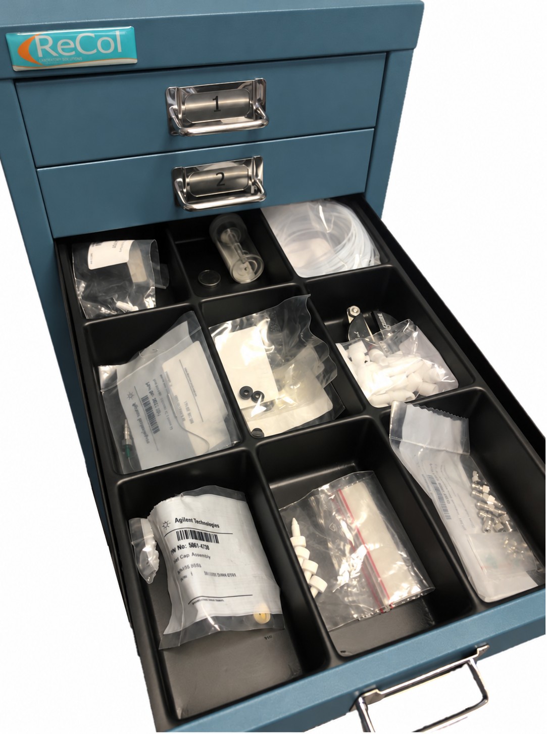 RECOLSERT nine-compartment tray installed in a standard teal RECOL drawer; cabinet and contents not included