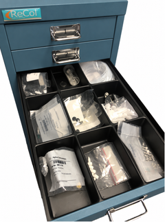 RECOLSERT nine-compartment tray installed in a standard teal RECOL drawer; cabinet and contents not included